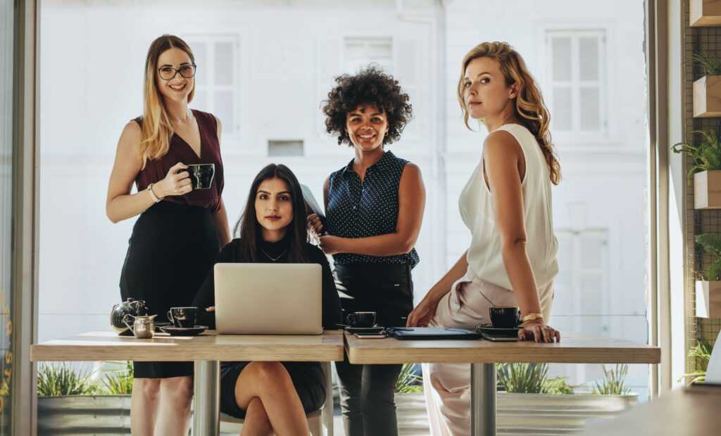 Portrait,Of,Four,Successful,Young,Businesswomen,Together,In,Office.,Group